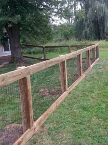 Backyard Fence-Woven Wire & Wood Rails       